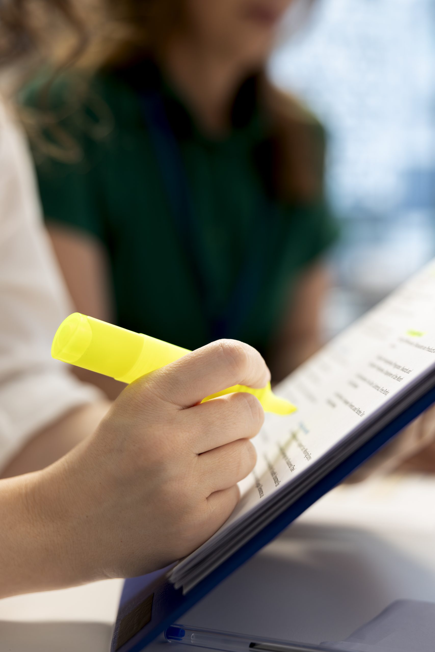 Human resources worker agreeing terms with candidate during job interview, highlighting text on documents. HR employee selecting candidates to work for company, using highlighter marker